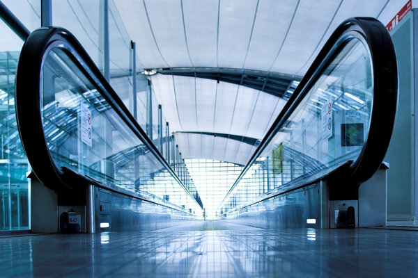 Enter to escalator inside modern airport