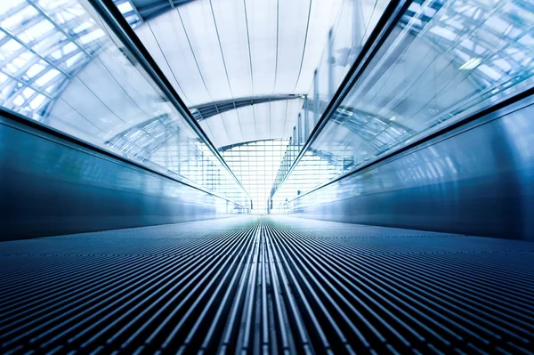 Moving escalator in office hall — Stock Photo, Image