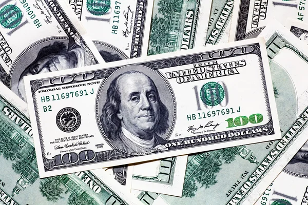 One hundred dollar banknotes background — Stock Photo, Image