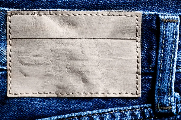 Jeans Hintergrund mit Etikett — Stockfoto