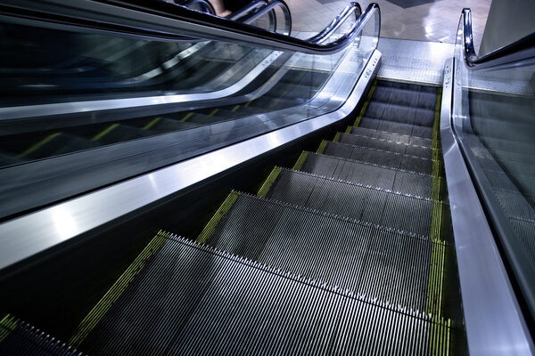 Moving escalator without