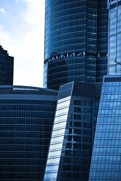 Crop of dark blue modern skyscrapers — Stock Photo, Image