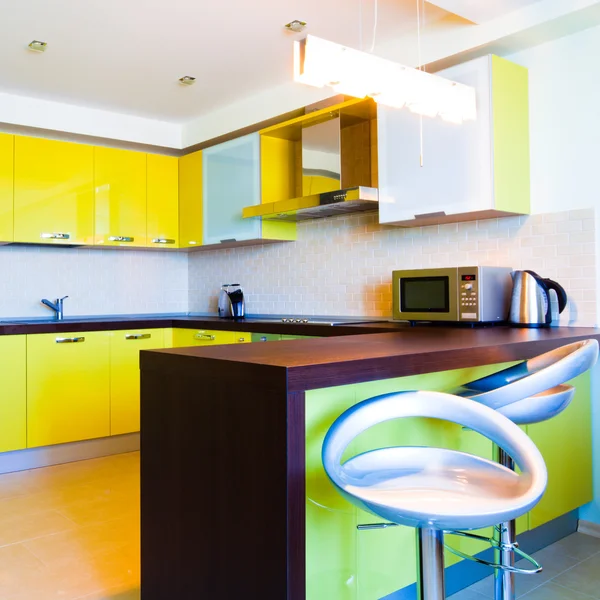 Stock image Yellow kitchen interior