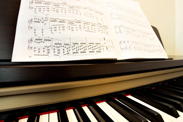 stock image Piano and music paper
