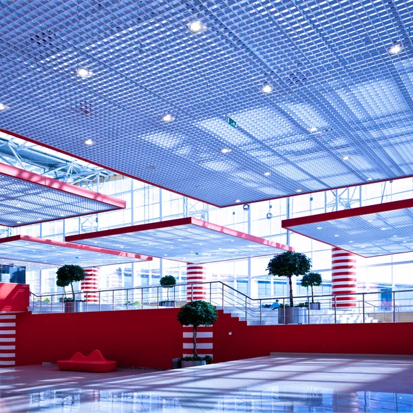 Red-blue hall in trade center — Stock Photo, Image