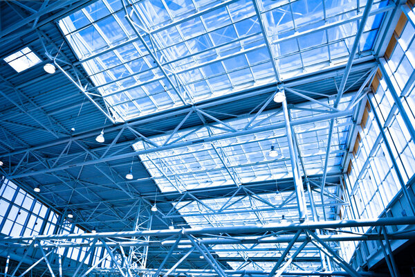 Blue unusual geometric ceiling of office building