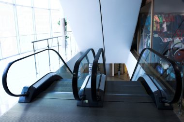 Two escalators in shopping mall clipart