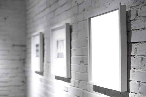 Tres marcos en la pared blanca —  Fotos de Stock