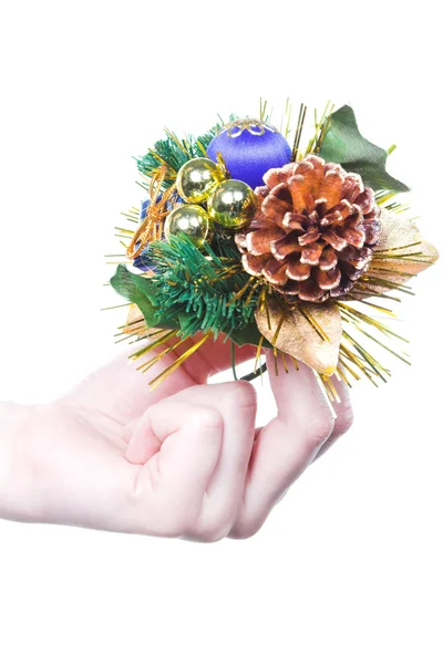 Kéz a karácsonyi dekoráció — Stock Fotó