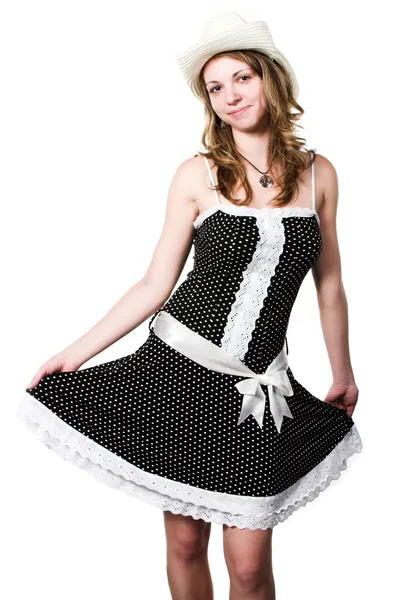 Serveerster in gevlekte jurk en stetson — Stockfoto