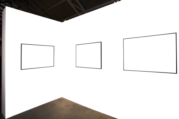 Drie lege frames op witte muur — Stockfoto