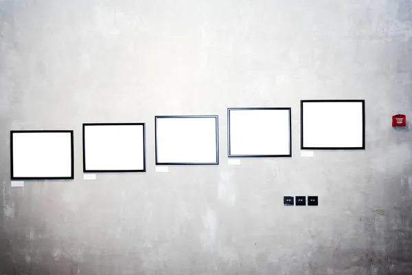 Wand in museum met frames — Stockfoto