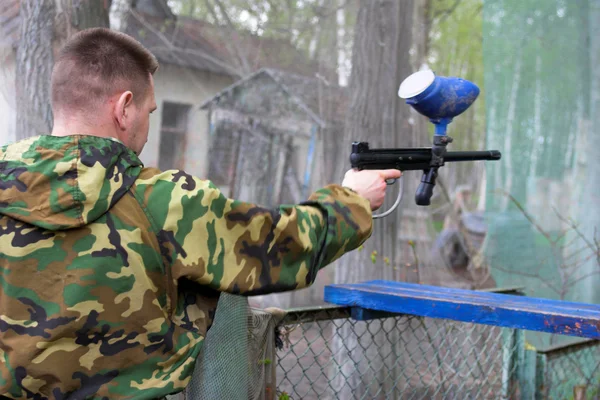 stock image Man in camouflage with a gun