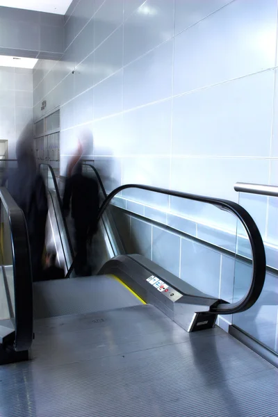 Moving crowd on escalator — Stock Photo, Image