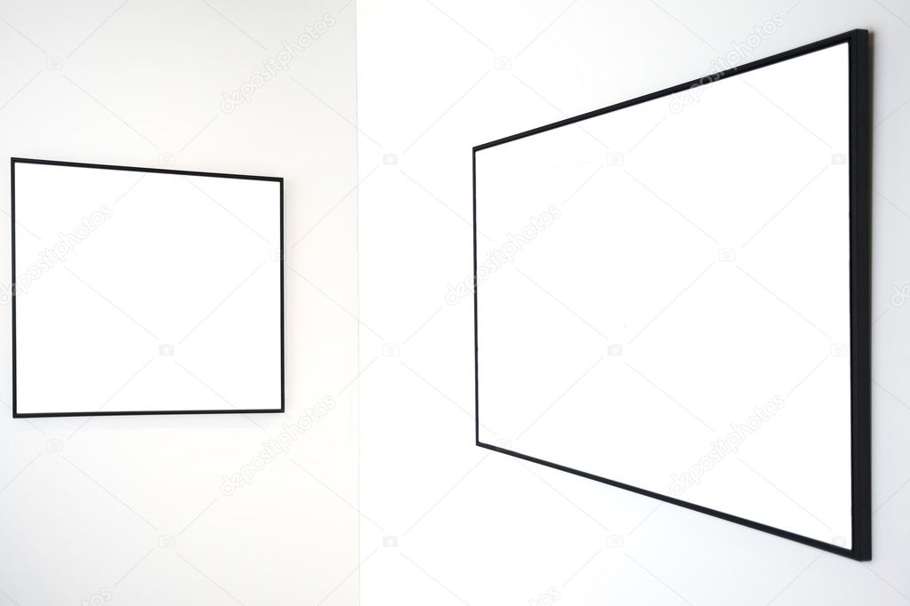 Two empty frames on white wall