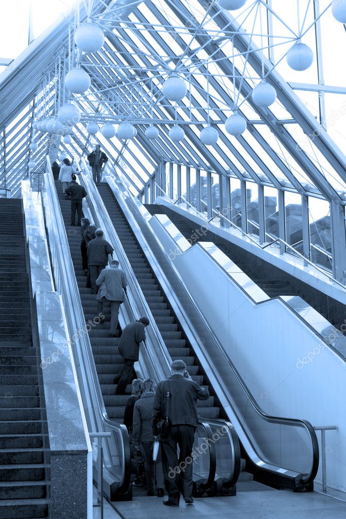 Diagonal escalators stairway in center