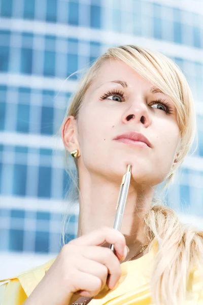 Girl with pen — Stock Photo, Image
