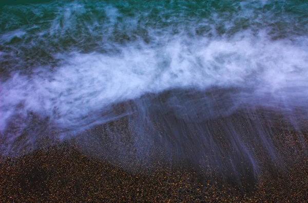 Mar azul e areia, longa exposição — Fotografia de Stock