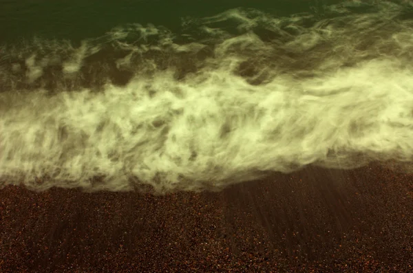 Mar verde e areia, longa exposição — Fotografia de Stock