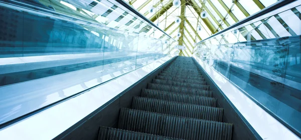 Move escalator in modern office Royalty Free Stock Images