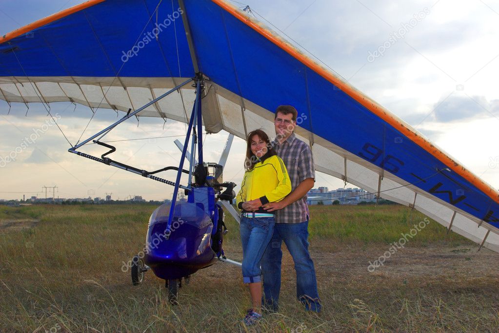 Couple with paraglide