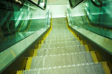 Move escalator in modern office clipart