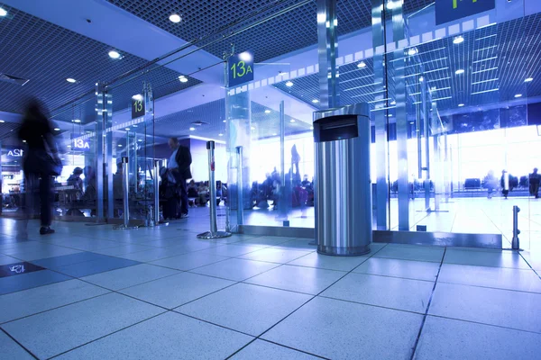 Blue gates in airport terminal — Stock Photo, Image
