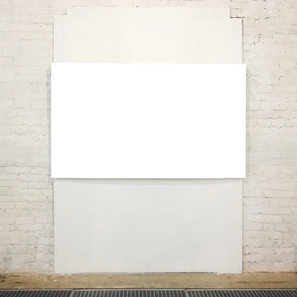Empty white banner on wall — Stock Photo, Image