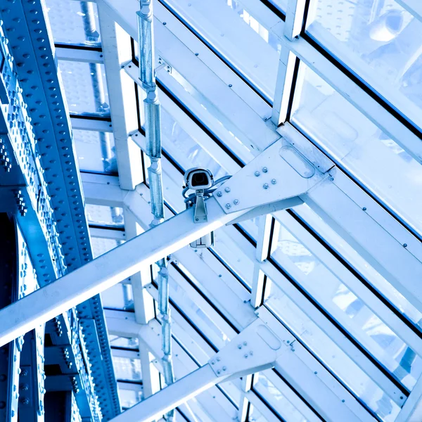 Blue constructions and camera — Stock Photo, Image