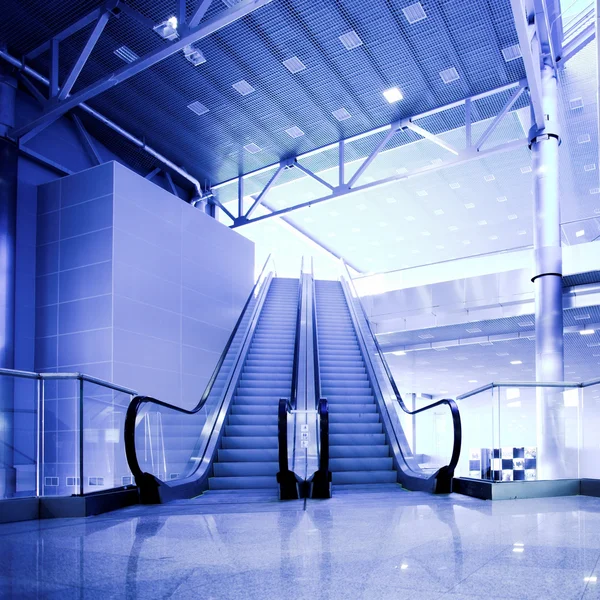 Escaleras mecánicas en exposición Imagen de stock