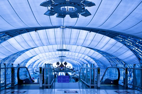 Blue corridor with escalators — Stock Photo, Image