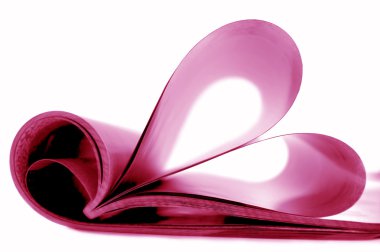 Pages of magazine curved into a heart sh clipart