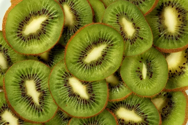 Fundo verde fatias kiwi — Fotografia de Stock