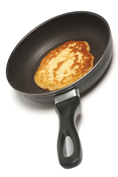Pancake cooking in a pan — Stock Photo, Image