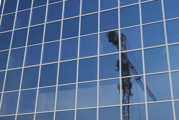 stock image Crane in modern building glass