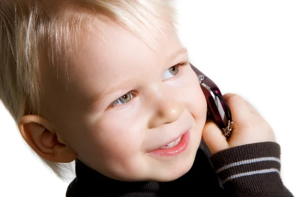 Kid on phone — Stockfoto