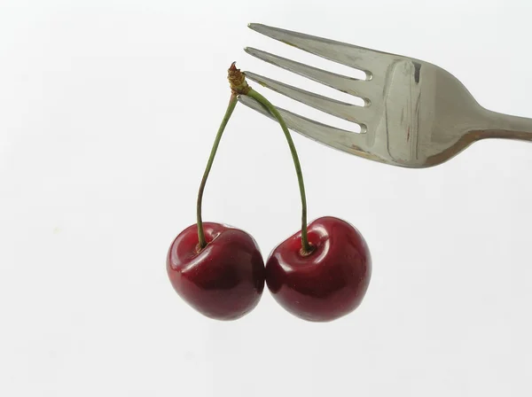Cherries on a plug — Stock Photo, Image