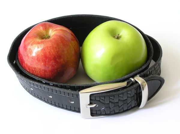 stock image Two apples in a belt