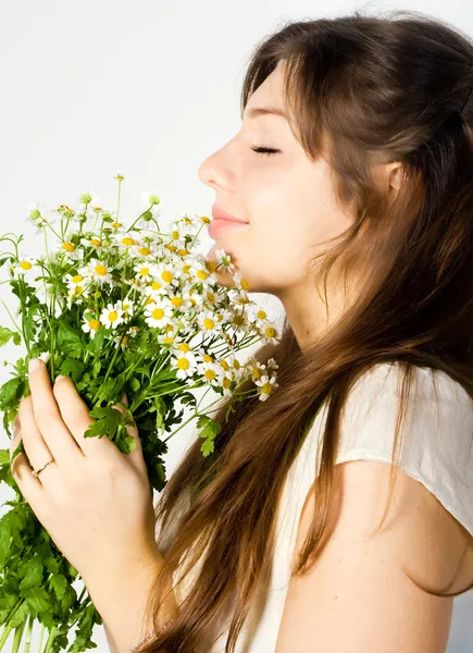 Girl and wildflowers — Stock Photo, Image