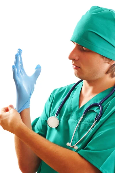 Pulling on surgical glove — Stock Photo, Image
