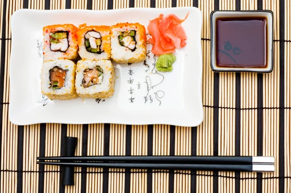 Sushi (rolls) on a plate — Stock Photo, Image