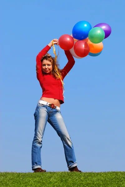 Flicka med ballonger — Stockfoto