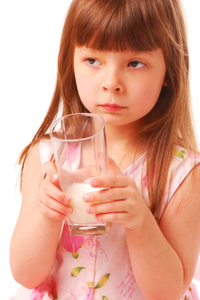 Girl with milk-moustache holding glass o — Stock Photo, Image