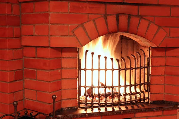 stock image Fireplace with iron lattice