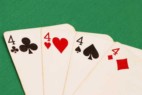 Stock image Four old playing cards