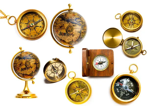 Compasses and globes — Zdjęcie stockowe