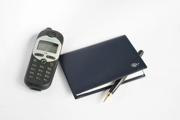 Caneta notebook telefone — Fotografia de Stock