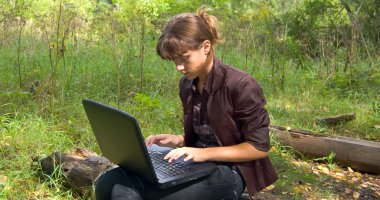 Web browsing in forest clipart
