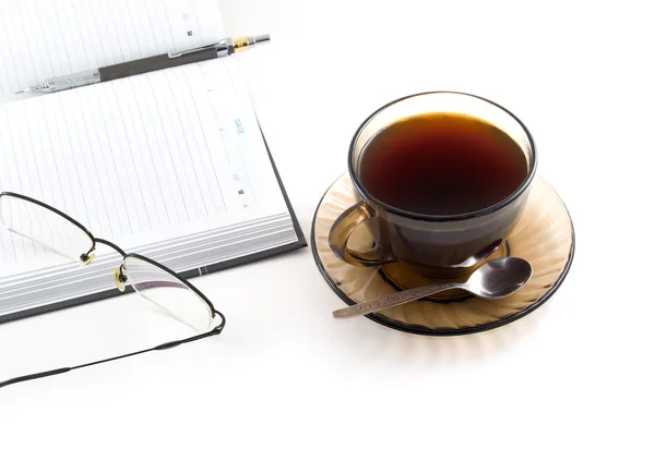 Dagelijkse planner en kopje koffie — Stockfoto
