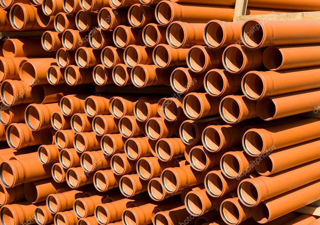 Stacked PVC orange pipes ⬇ Stock Photo, Image by © grekoff #1201846